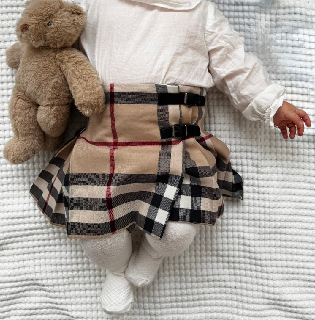 Burberry beige kjol storlek 80/12 mån