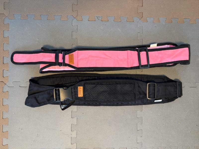 Two Baby slings - max 20 kg - black and pink