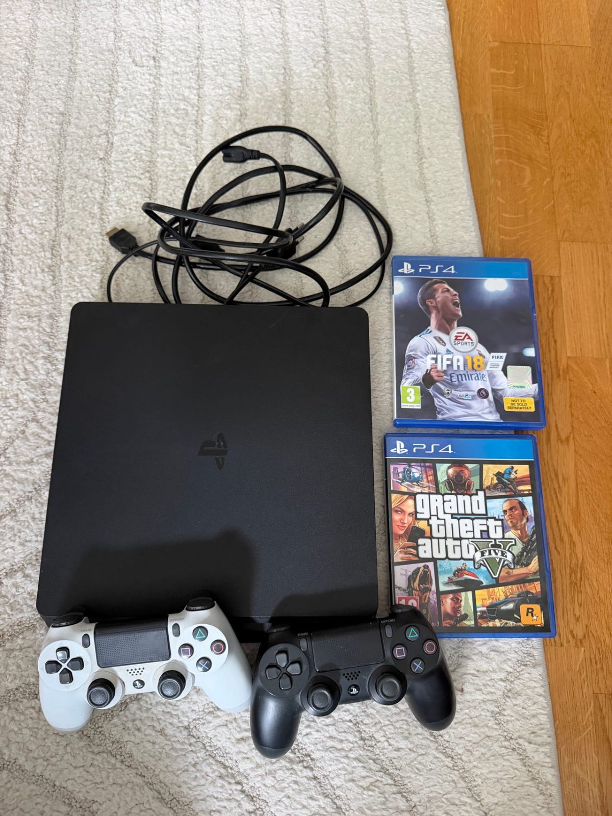 Sony PlayStation 4 1TB spelkonsol med handkontroller och spel